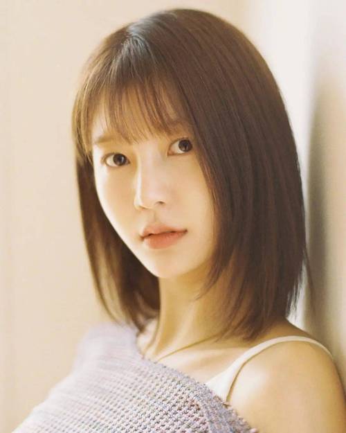 长尖脸适合什么发型_齐刘海微卷发修饰长脸型 长尖脸适合什么发型_齐刘海微卷发修饰长脸型